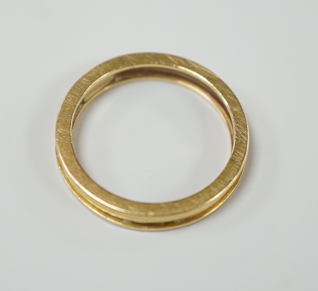 A modern Theo Fennel 18ct gold band, size R, gross weight 4.8 grams.